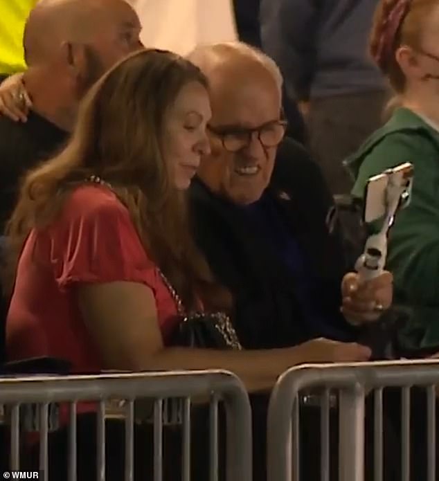 The two were captured sitting next to each other and chatting at a New Hampshire Fisher Cats minor league baseball game