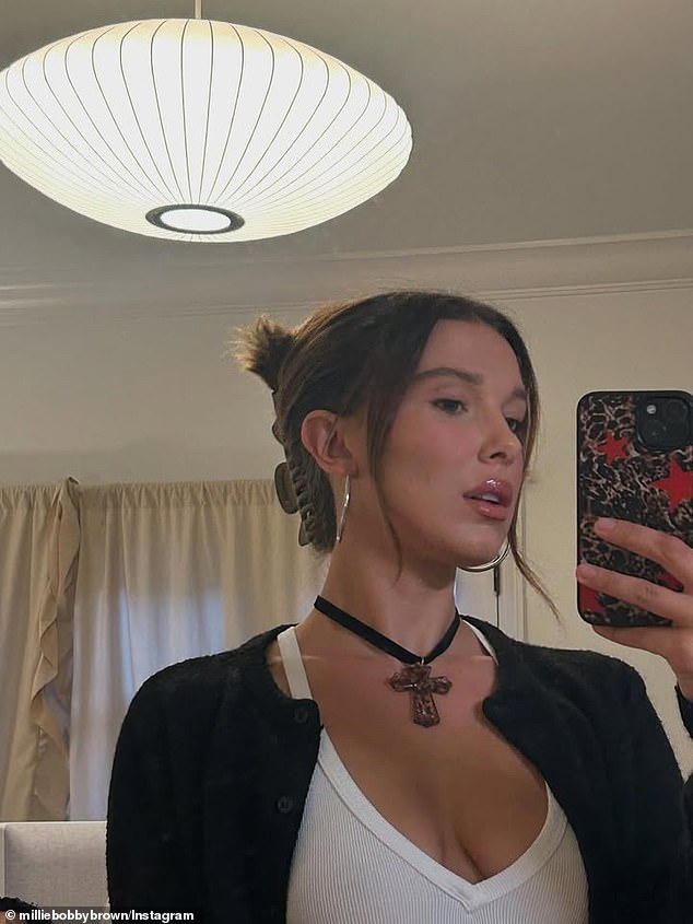 Brown modeled a cross around her neck in this selfie