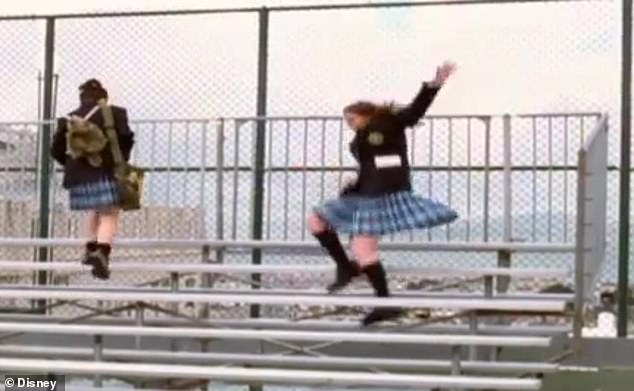 The video showed her falling in the 2001 hit The Princess Diaries , where she toppled down the high school bleachers