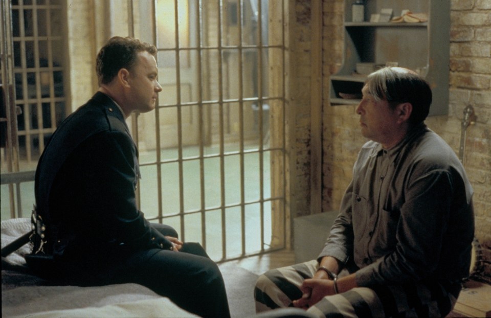 Tom Hanks and Graham Greene in a scene from *The Green Mile*.