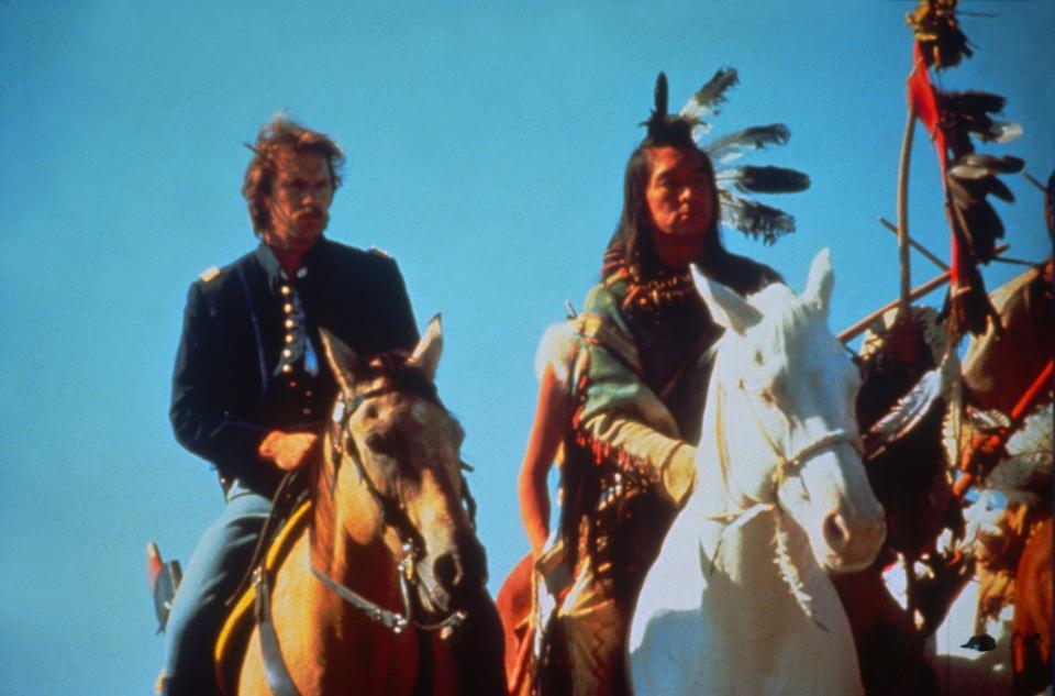 Still from *Dances with Wolves* showing Kevin Costner and Graham Greene on horseback.
