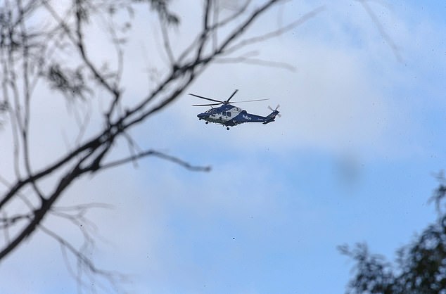01 SEPT 2025 SYDNEY NSWWWW.MATRIXNEWS.COM.AUCREDIT: MATRIXNEWS FOR DAILYMAIL AUSTRALIA*** EXCL***ASSIGNMENT:  EXPLOSIONS HEARD OVER NEIGHBOURING PROPERTY TO DEZI FREEMANAs the VIC Police Helicopter hovered overhead nearly coming in to land at one stage, a series of explosive rounds were detonated in the forest and are bounded by the Buckland river on a neighbouring property to that occupied by alleged killer Dezi Freeman. The property was surveilled by Vic Police for almost two hours during which Police had the are near the roadside under a police operation. It is not known what the outcome of this operation is at this stage. Special tactics groups and other specialist police are working with ACT cops in the hunt for Dezi Freeman as weather and conditions have again made the search for the wanted man difficult.