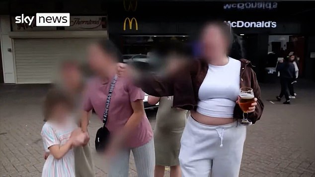 The woman then shouts a number of racist terms at Zahin