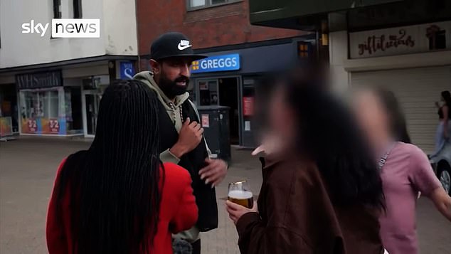 Zahin attempts to engage the women in conversation but is quickly shouted down