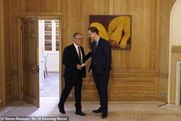 Keir Starmer speaks with Darren Jones after appointing him as Chief Secretary to the Prime Minister on Monday