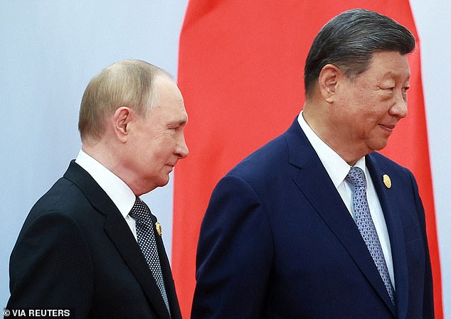 Russian president Vladimir Putin (left, pictured with Chinese president Xi Jinping, right) is among the leaders expected to attend the People's Liberation Army (PLA) parade in Beijing on Tuesday
