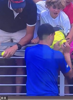 Kamil Majchrzak was signing autographs for young fans after his marathon five-set victory
