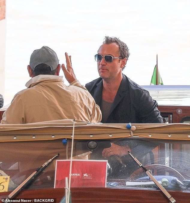 He was spotted thanking the boat driver and shaking his hand before turning to step onto the dock when he fell