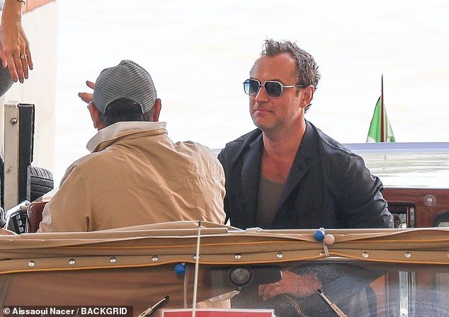 Jude was all smiles as he arrived at the airport before tripping over