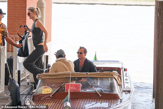 Philippa styled her long blonde tresses in a ponytail and carried a large tote handbag