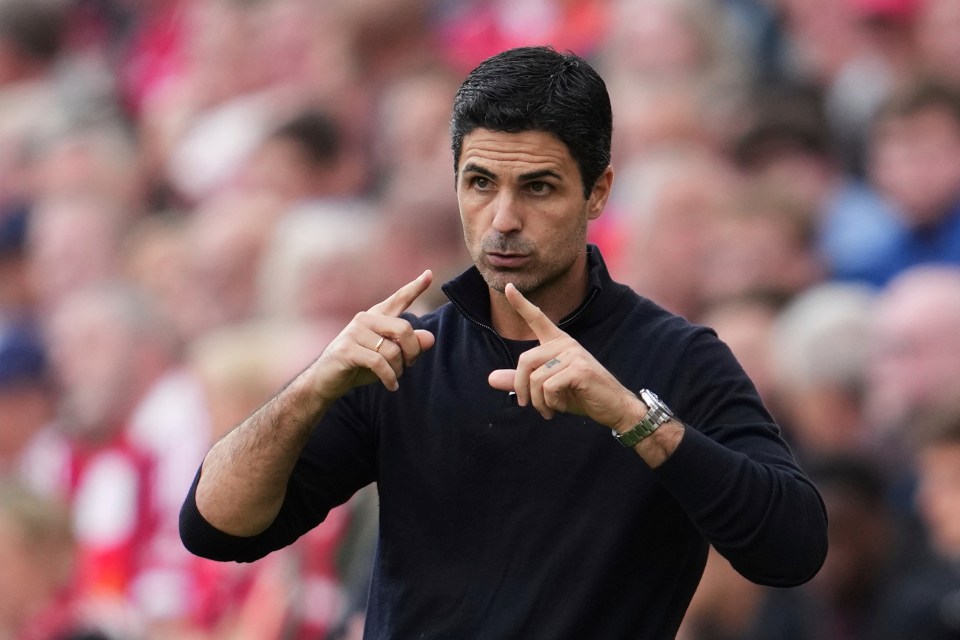 Mikel Arteta gesturing during a soccer match.