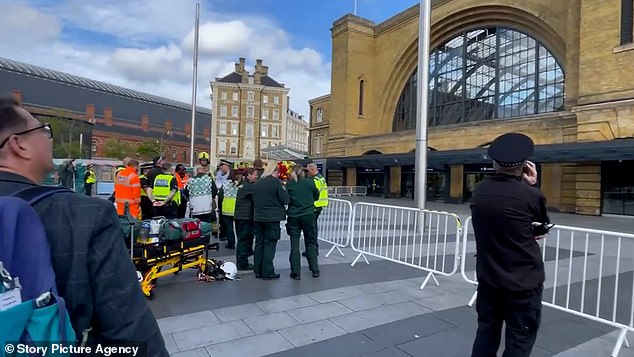 Emergency services have fenced off the front of Kings Cross station