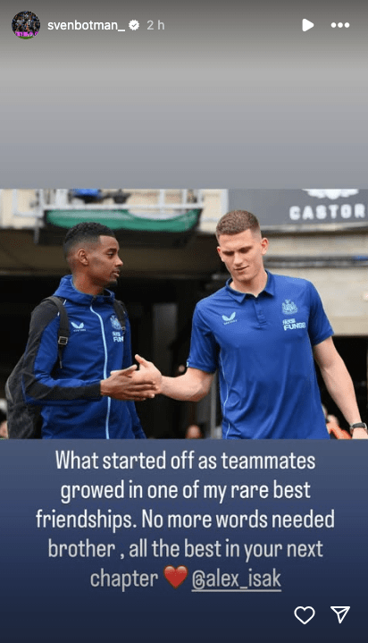 Two soccer players shaking hands.