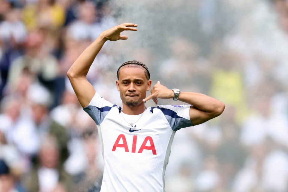 Xavi Simons of Tottenham Hotspur performing his trademark celebration.