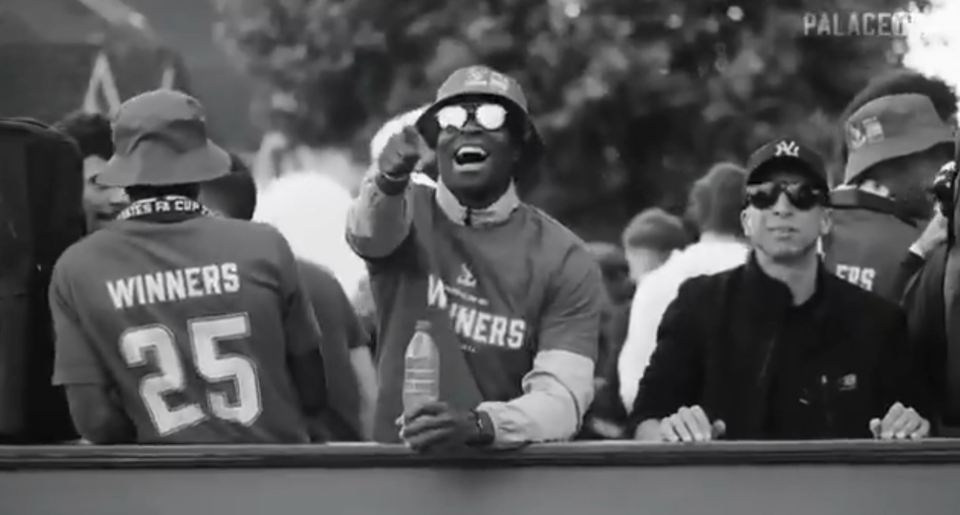 Black and white video still of Marc Guehi celebrating.