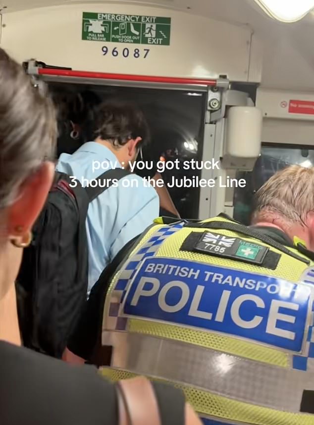 The grim experience is far from over, however, as commuters, many of whom are dressed in smart work attire, traipse through a dark tunnel