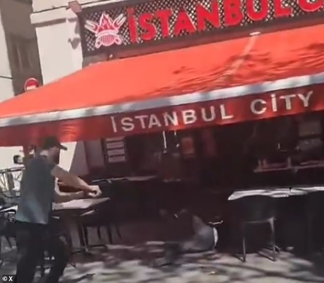 The man was reportedly subdued with a stun gun before being shot by police