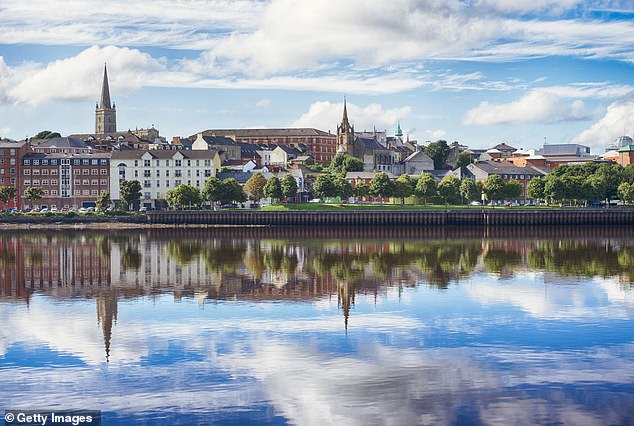 In Northern Ireland, homes in Derry (pictured) and Strabane now sell in 24 days