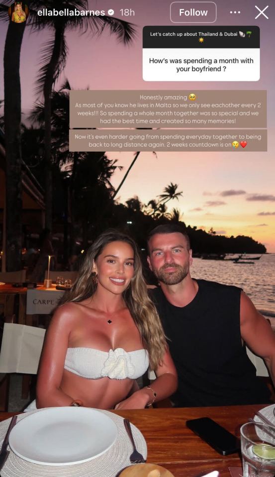 Couple sitting at an outdoor restaurant at sunset.