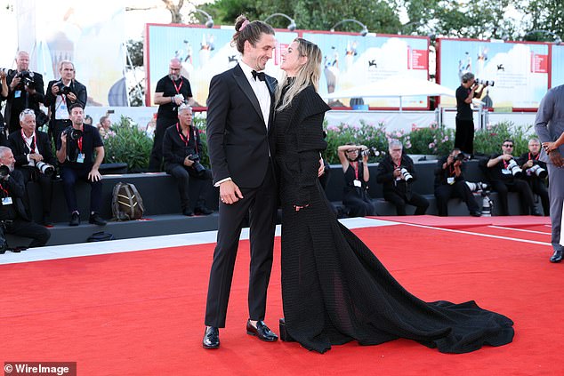 Rebecca Ferguson and her husband Rory Dote also put on a loved-up display in front of the cameras