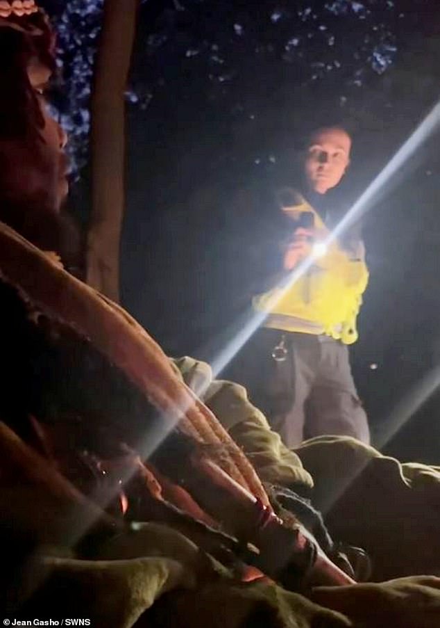 In one video clip, a police officer can be seen carrying out a welfare check on the tribe