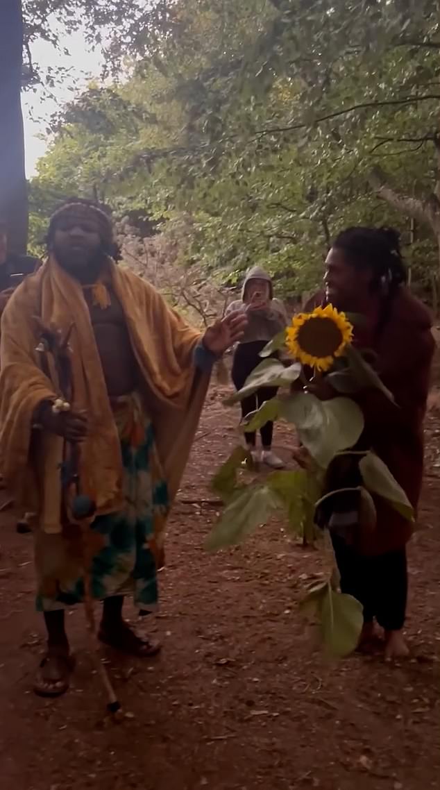 The video showed one tribe member dancing with a sunflower