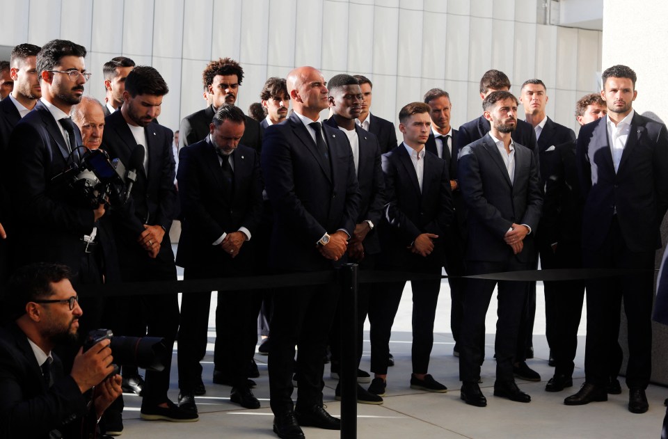 Portuguese soccer team members and manager Roberto Martinez at a homage event.