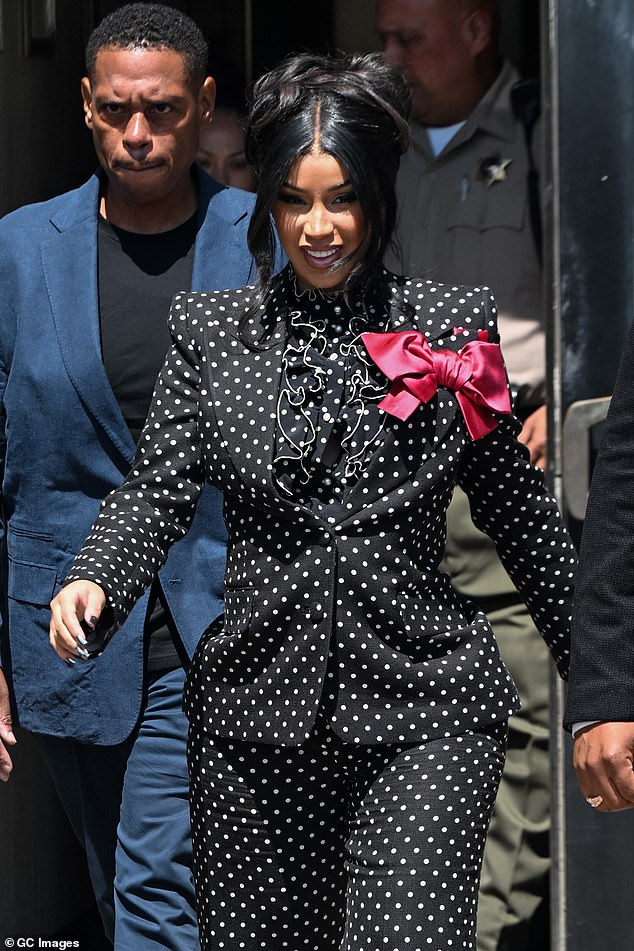 Cardi seemed to be in high spirits after all 12 jurors ¿ six men and six women ¿ agreed that she was not responsible for the assault, though it only required nine to vote in her favor