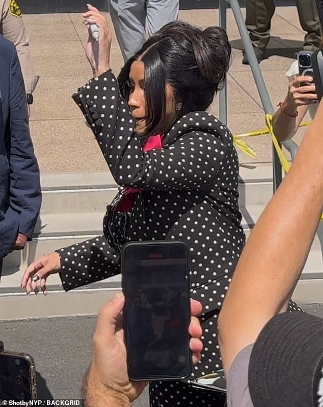 She accessorized with a glittery pair of earrings