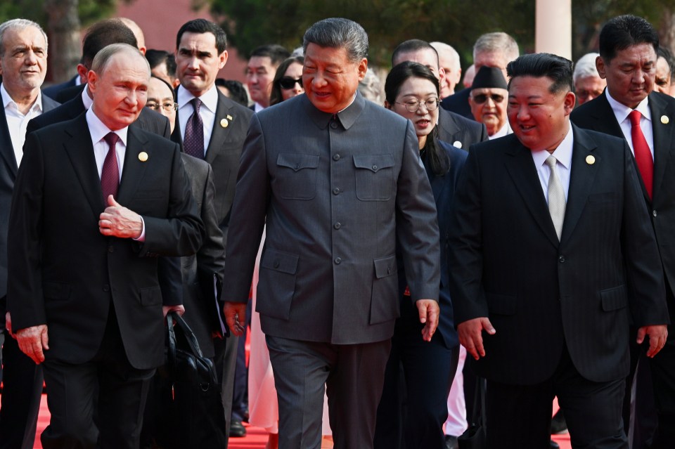 Vladimir Putin, Xi Jinping, and Kim Jong Un arrive at a military parade.
