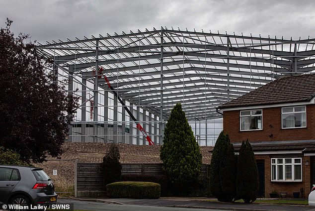 The steel structure pictured towering over a row of homes in the area
