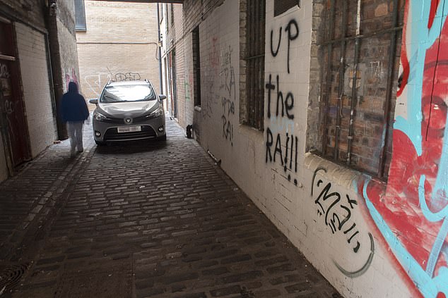 Pictured: The notorious New Wynd lane in Glasgow city centre, close to Trongate, which is rife with drug taking