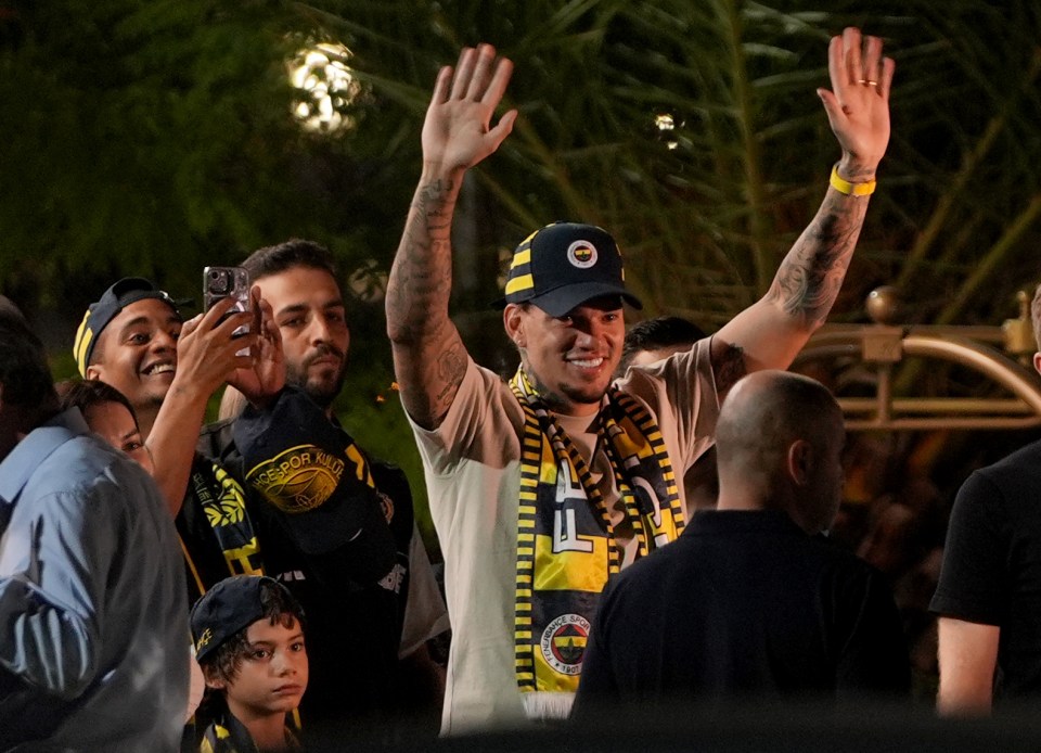 Brazilian goalkeeper Ederson waving to fans in Istanbul.