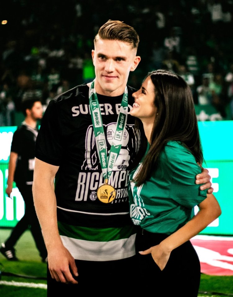 Viktor Gyokeres and Ines Aguiar celebrating with a medal.