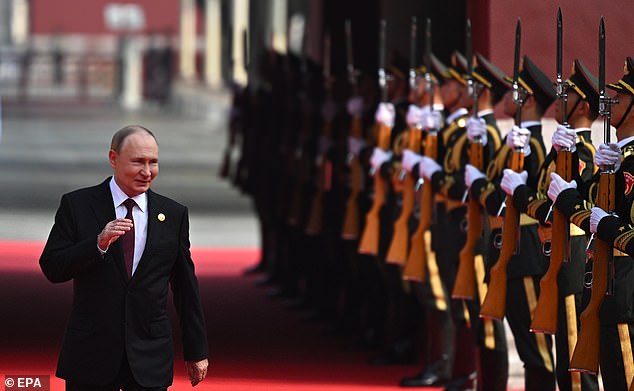 Russian President Vladimir Putin arrives to attend the military parade in Beijing