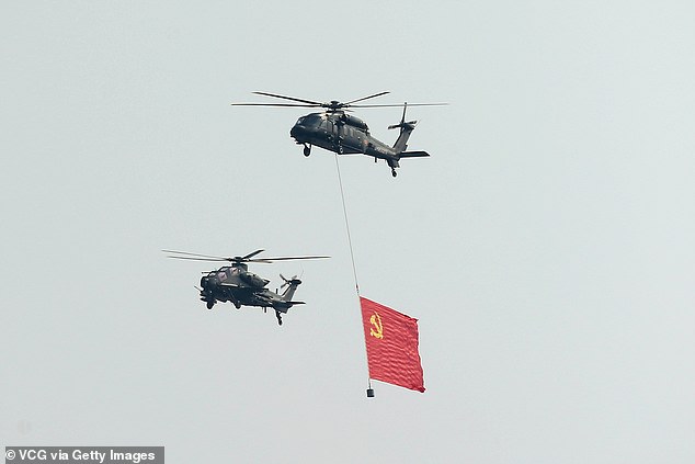 The echelon of Z-20 helicopter carries the flag of the Chinese Communist Party