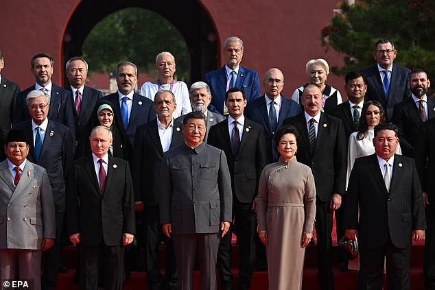 (L-R) Indonesian President Prabowo Subianto, Russian President Vladimir Putin, Chinese President Xi Jinping with his wife Peng Liyuan, North Korean leader Kim Jong Un and heads of foreign delegations pose for a photo before a military parade marking the 80th anniversary of the end of World War II