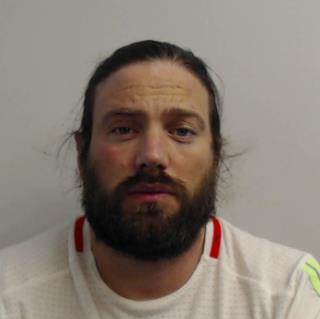 Mugshot of Christopher Harkins, convicted of sexual and violent offences.