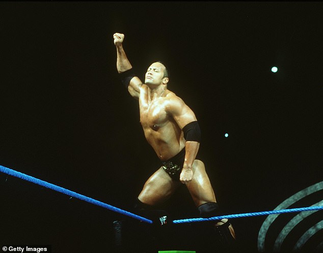Dwayne started his showbiz career as wrestler The Rock on WWE (pictured in the ring in 2000)