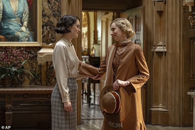 Michelle Dockery, left, and Laura Carmichael, right, are seen in a scene from 'Downton Abbey: The Grand Finale'