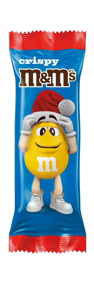 Illustration of a package of Crispy M&M's featuring a yellow M&M's character wearing a Santa hat.