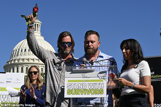 Family members of Virginia Roberts Duffey, Scott Roberts (C), his wife Amanda Roberts (R) and brother Daniel Wilson, speak at the Stand with Survivors Rally in support of Jeffrey Epstein and Ghislaine Maxwell's victims