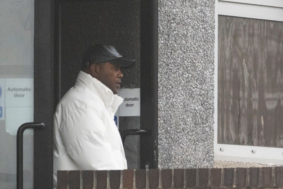Moffat Konofilia leaving a building.