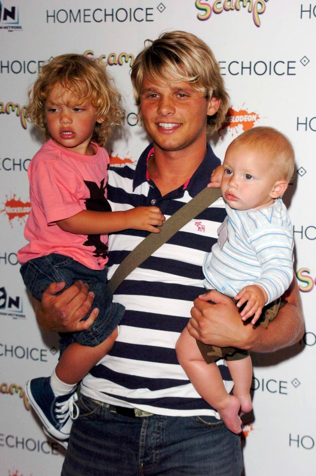 Jeff Brazier with his two sons at an event.