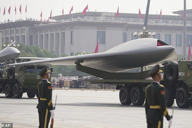 A GJ-11, the next-gen stealth unmanned combat aerial vehicle, takes part in the military parade