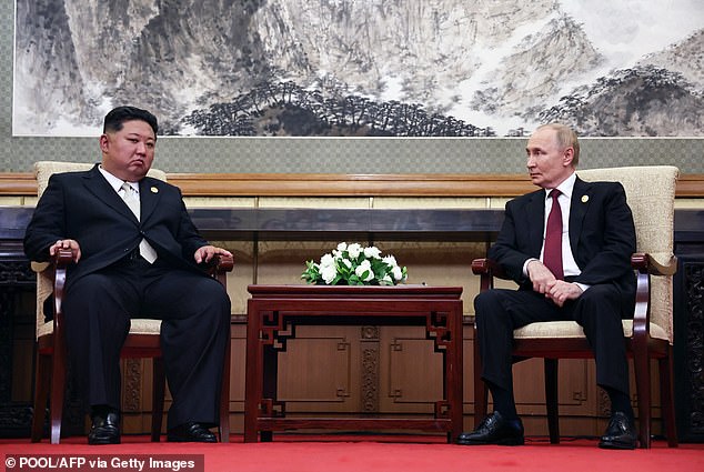 Russian President Vladimir Putin (pictured, right) and North Korean State Chairman Kim Jong Un (pictured, left) met after attending a military parade