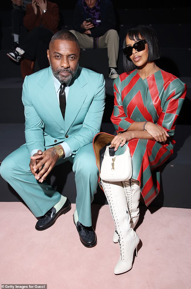 Actor Idris Elba and wife Sabrina Dhowre attend the Gucci show during Milan Fashion Week in 2023