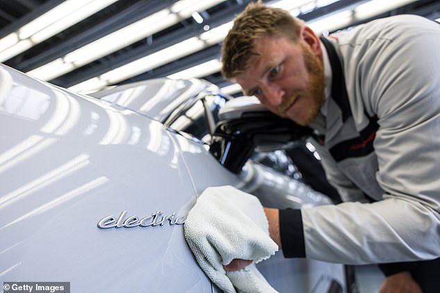 Porsche's CEO in July warned staff that it will make a wave of redundancies across its business after being 'hit hard' by falling electric vehicle sales