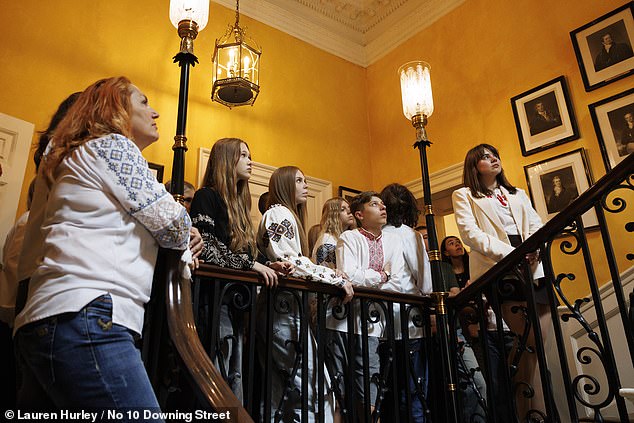 The children listened as Prime Minister Keir Starmer spoke to them on the stairs of No.10 inbetween meetings