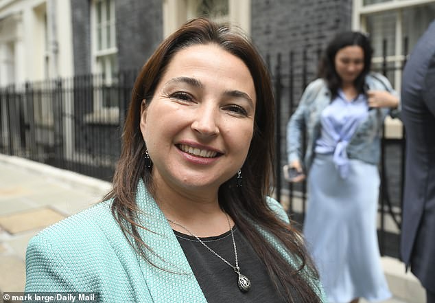 Inna Hryhorovych, whose tireless work for the London-based St Mary's Ukrainian Trust has made the trip possible, pictured in Downing Street after the children met the Prime Minister
